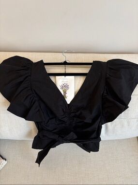 INTERMIX Black Puff-Sleeve Crop Top with V-neck and Tie Waist.